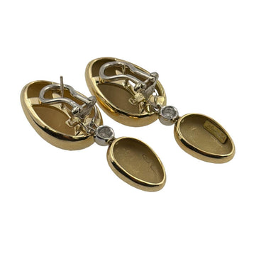 18K Gold pebble ear pendants by Antonini.