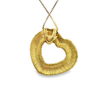 18K yellow gold diamond heart pendant.