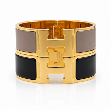Hermès, Pair of Wide Enamel and Gold‑Plated “H” Bangles, 21 mm