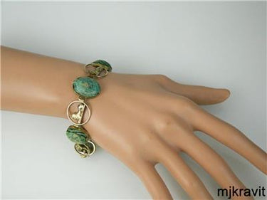 Egyptian Revival Yellow Gold and Carved Scarabs Hieroglyphic Panel Bracelet