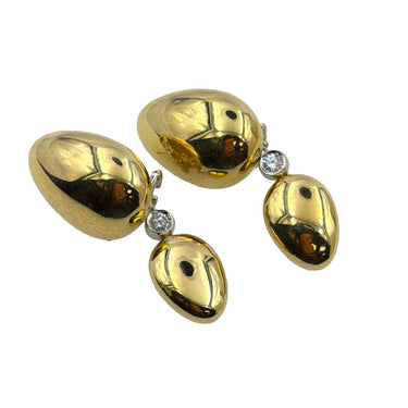 18K Gold pebble ear pendants by Antonini.