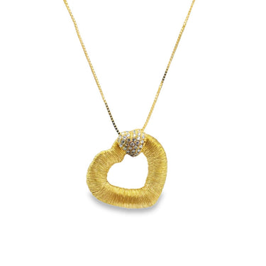 18K yellow gold diamond heart pendant.
