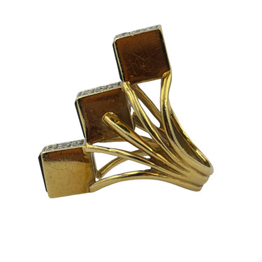 Vintage 18K gold sculptural onyx and diamond ring