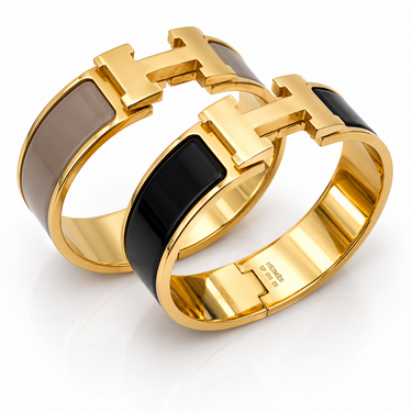 Hermès, Pair of Wide Enamel and Gold‑Plated “H” Bangles, 21 mm
