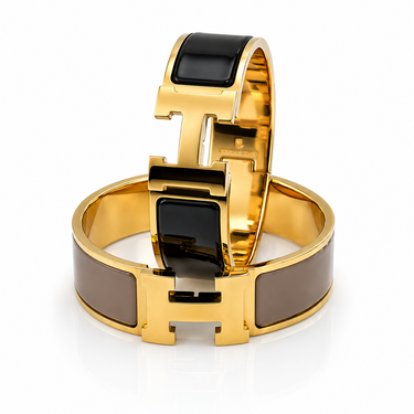 Hermès, Pair of Wide Enamel and Gold‑Plated “H” Bangles, 21 mm