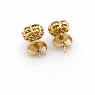 A pair of 18K yellow gold diamond cluster earrings.