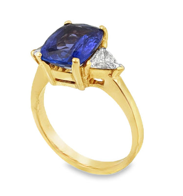 Fine Three‚ÄëStone Diamond & Tanzanite Ring.